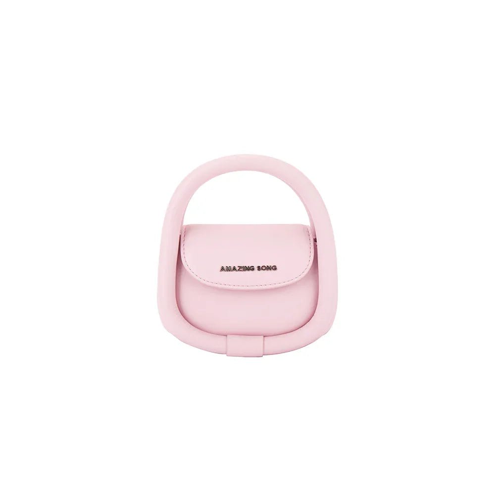 Pastel pink Amazing Song mini handbag with top handle on white background