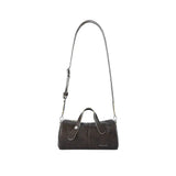 Amazing Song brown leather handbag with long adjustable strap on white background