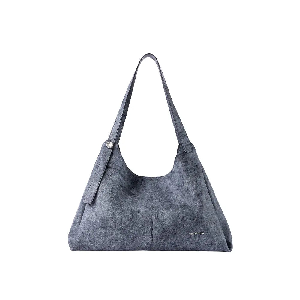 Amazing Song gray shoulder bag with textured finish and single strap on white background