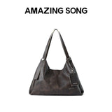 Amazing Song dark brown leather shoulder bag with attached tag, white background