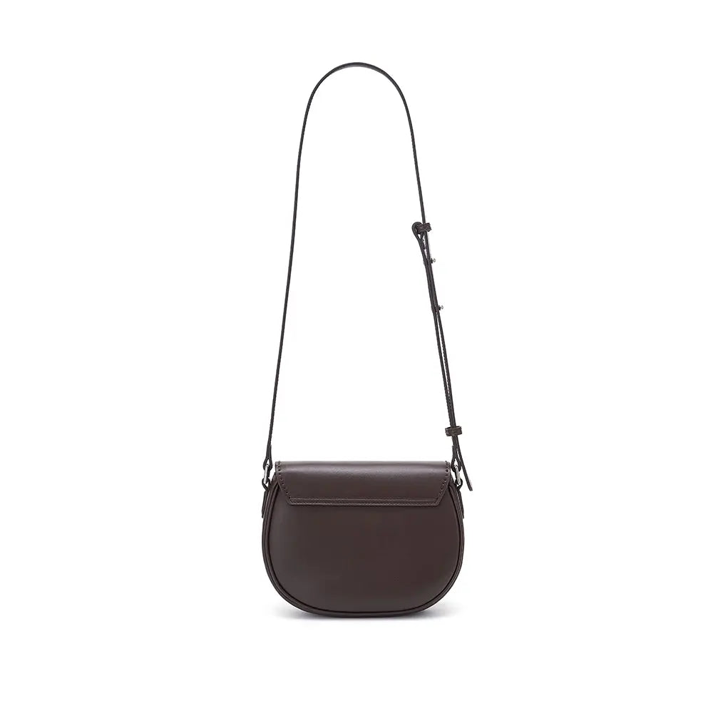 Minimalist dark brown leather crossbody bag on white background, Amazing Song fashion accessory