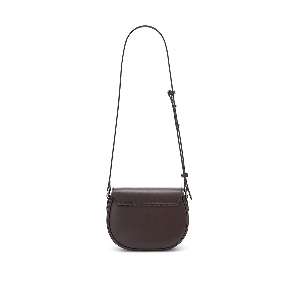 Minimalist dark brown leather crossbody bag on white background, Amazing Song fashion accessory