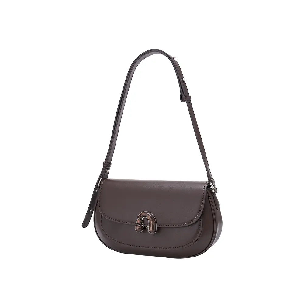 Amazing Song brown leather shoulder bag with metal clasp on white background