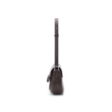 Side view of a brown leather handbag with adjustable strap on white background, Amazing Song