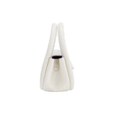 Side view of a white leather handbag with round button detail, Amazing Song collection