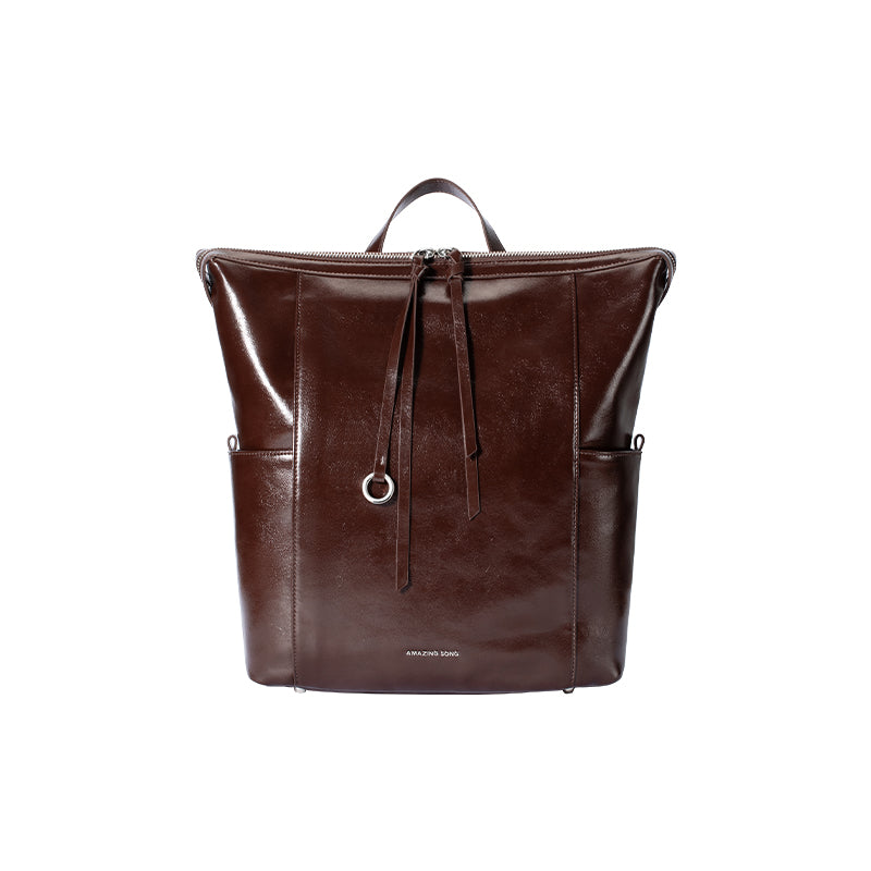 Amazing Song brown leather backpack with top handle and front drawstring detail