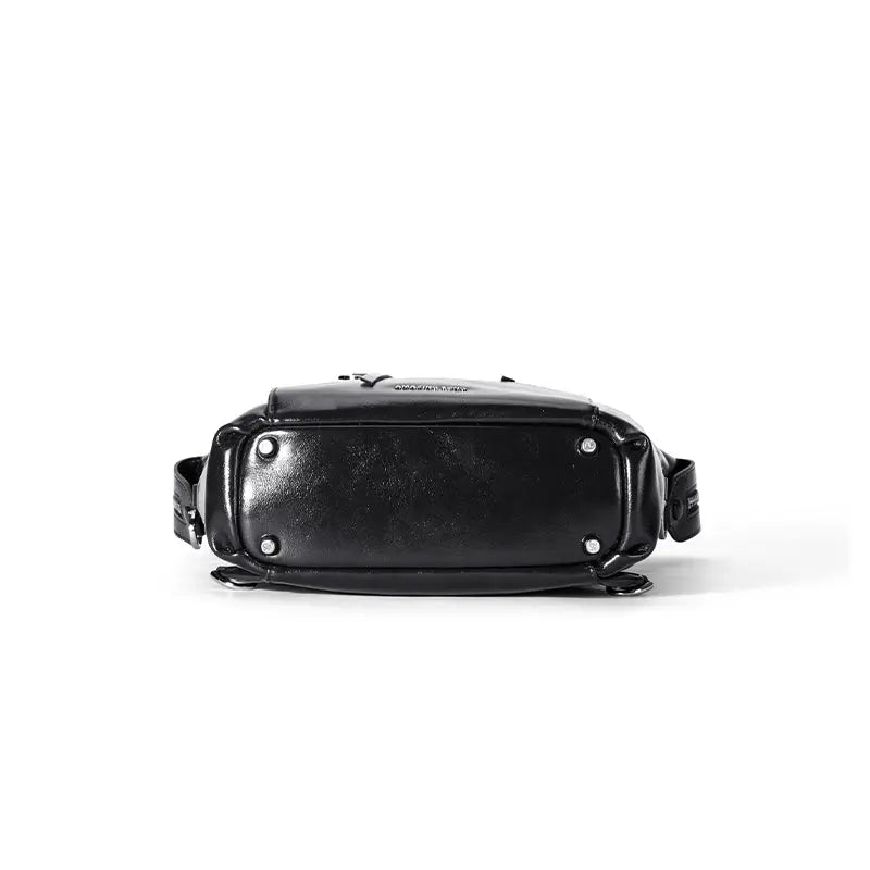 Black leather crossbody bag bottom view, silver hardware, Amazing Song branding