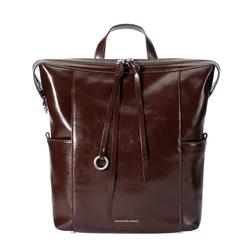 Amazing Song dark brown leather backpack with zipper and front ring accent