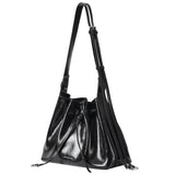 Black leather bucket bag with adjustable strap, Amazing Song branding, product photo