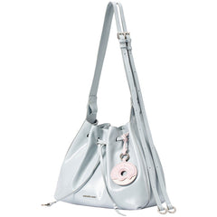 Light blue Amazing Song bucket bag with adjustable strap and pink donut charm