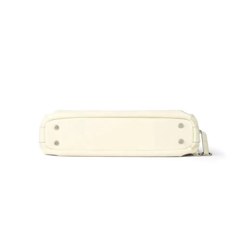 Bottom view of cream-colored rectangular shoulder bag on white background from Amazing Song