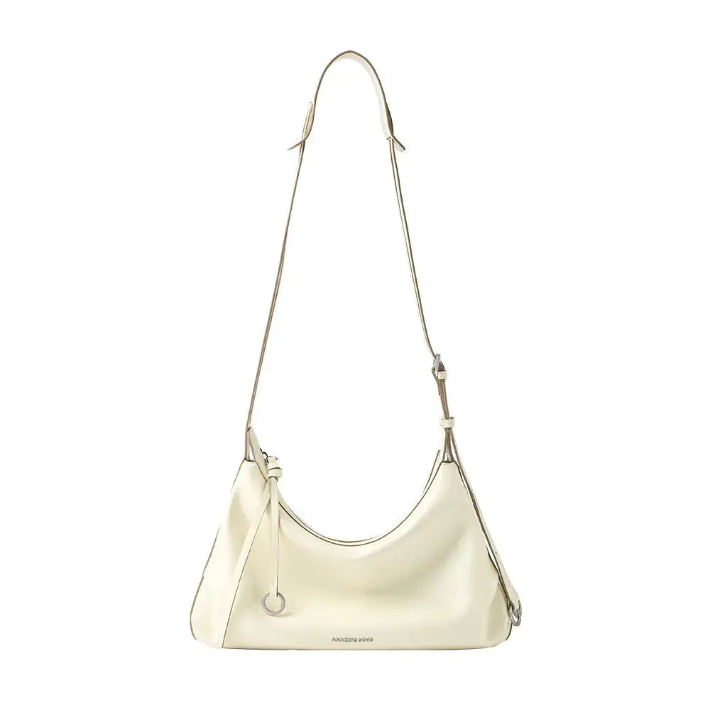 Amazing Song cream shoulder bag with adjustable strap against white background
