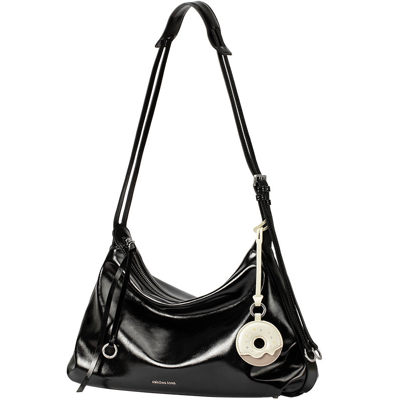 Amazing Song black shoulder bag with double strap and donut keychain accessory