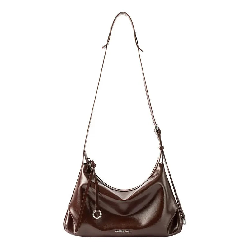 Amazing Song brown leather shoulder bag with silver ring detail and adjustable strap