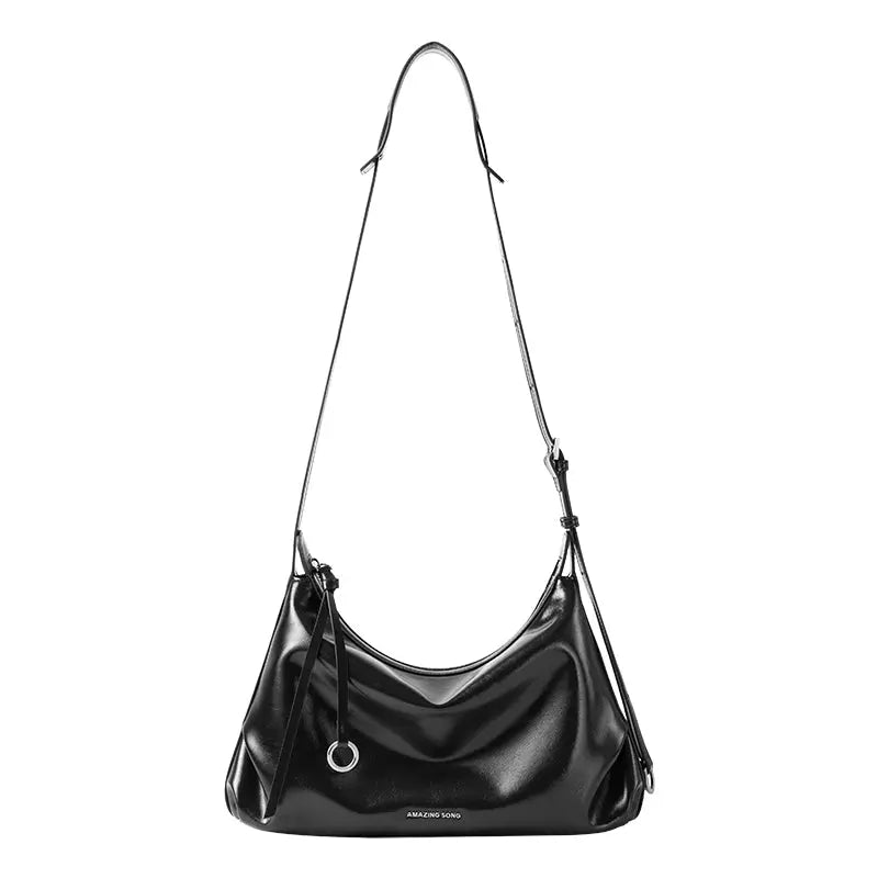 Amazing Song black leather shoulder bag with adjustable strap and silver ring detail