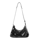 Amazing Song black leather shoulder bag with silver ring detail and adjustable strap
