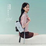 Woman with light blue backpack sitting on white sofa, pastel background, Amazing Song