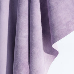 Close-up of soft lavender suede fabric with textured surface, Amazing Song official site