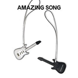 Amazing Song guitar-shaped bag charms in black and white on a white background