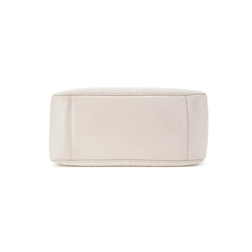 Bottom view of a white woven handbag with leather panels, Amazing Song official website
