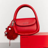 Amazing Song red handbag with fluffy keychain on branded red box