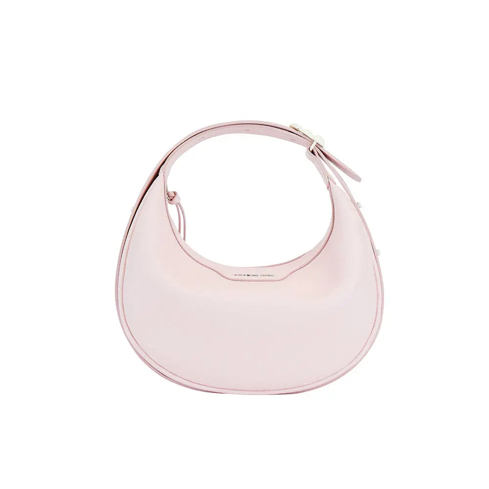 Light pink crescent-shaped leather handbag with top handle on white background, Amazing Song