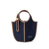 Amazing Song denim handbag with brown trim and pearl accent on white background