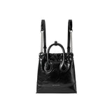 Amazing Song black leather handbag with chain straps and top handle, isolated on white