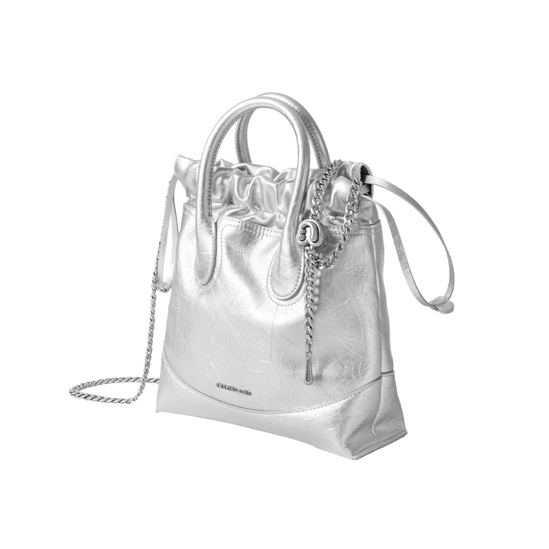 Amazing Song metallic silver handbag with chain strap and drawstring top