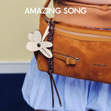 Amazing Song brown suede handbag with flower keychain and front zipper detail