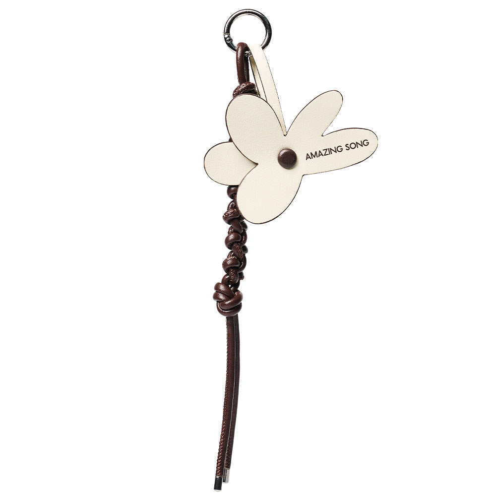 Amazing Song floral leather keychain with braided brown strap and metal ring