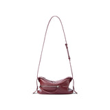 Amazing Song burgundy leather crossbody bag with adjustable strap and front zipper pocket