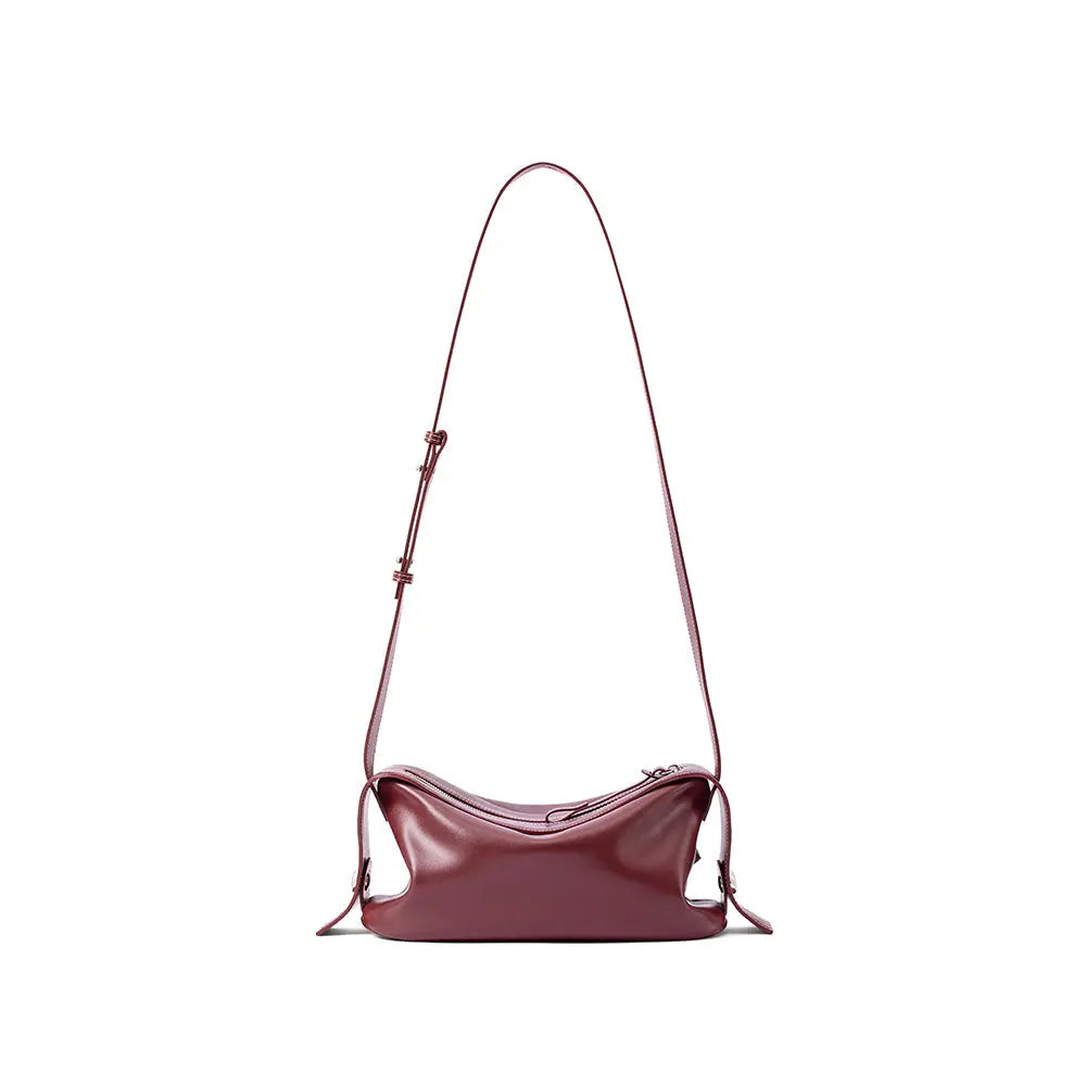 Burgundy leather shoulder bag with adjustable strap, featured on Amazing Song website