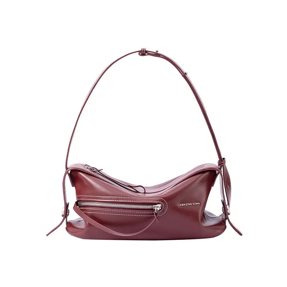 Amazing Song maroon leather shoulder bag with zipper and adjustable strap on white background