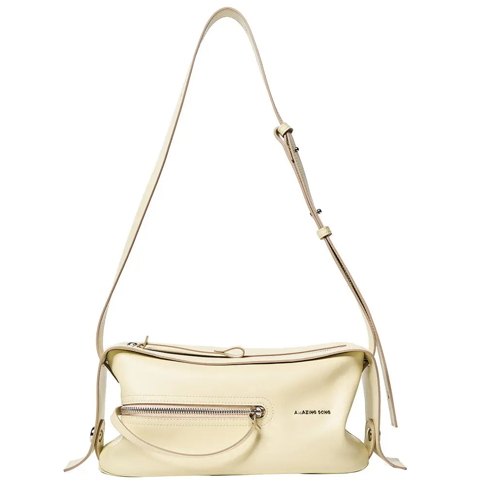 Amazing Song cream leather shoulder bag with front zipper pocket and adjustable strap