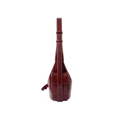 Side view of a burgundy leather bag with adjustable strap, Amazing Song official website