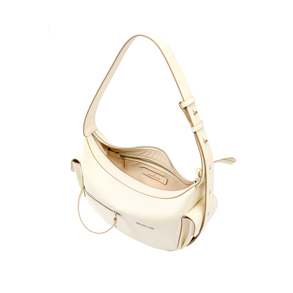 Cream leather shoulder bag with zip closure from Amazing Song on white background