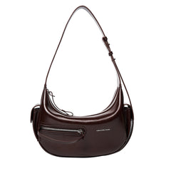 Amazing Song brown leather shoulder bag with front zipper pocket on white background