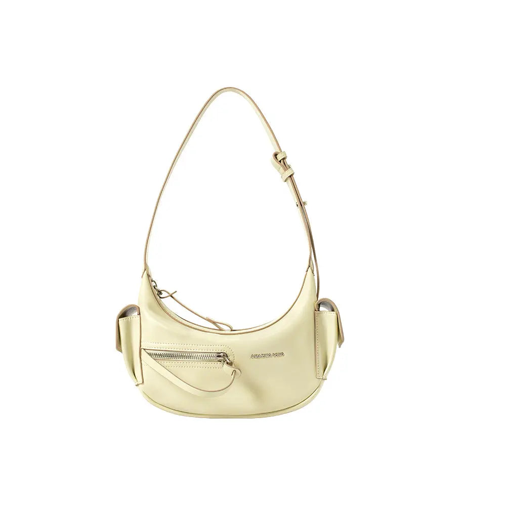 Cream shoulder bag with front zipper pocket and Amazing Song logo on white background