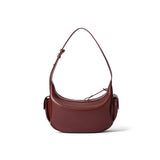 Brown leather shoulder bag with adjustable strap, displayed on white background