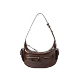 Amazing Song brown leather shoulder bag with front zipper and side pockets on white background