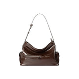 Amazing Song glossy brown leather shoulder bag with adjustable strap and front zipper pocket