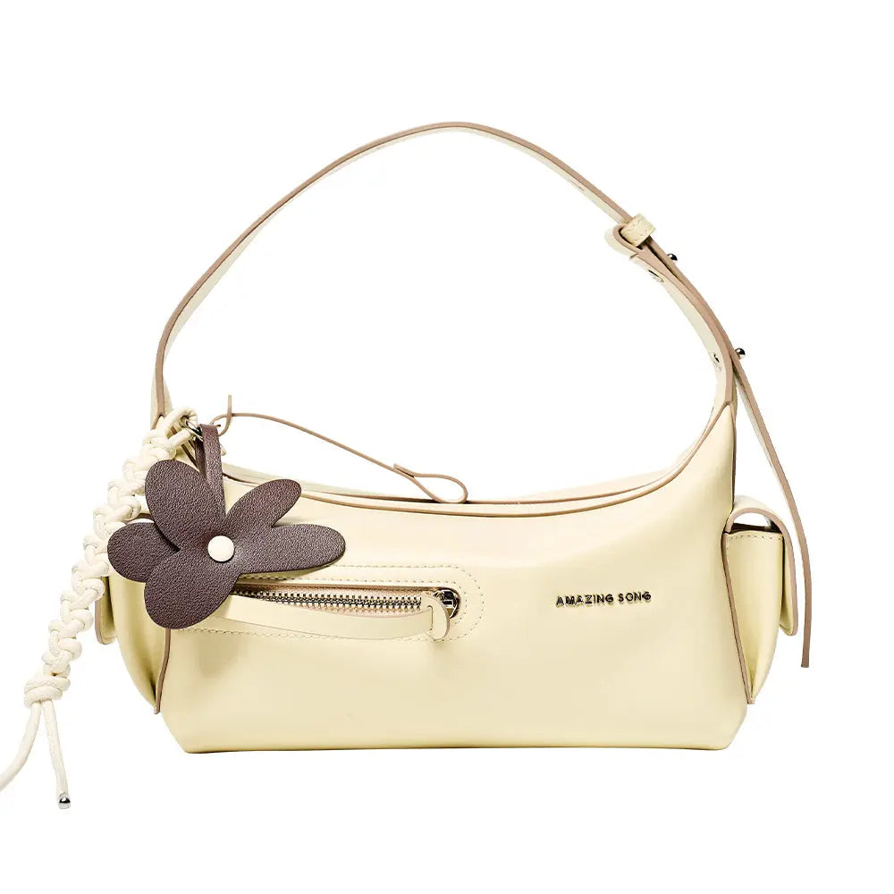 Amazing Song cream shoulder bag with front zipper, brown flower charm, and braided strap