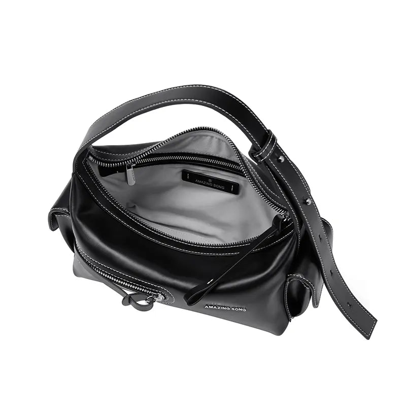 Amazing Song black leather handbag with open zipper, visible logo, and white stitching