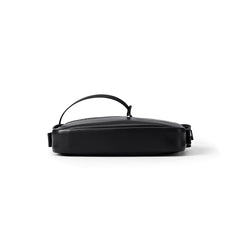 Sleek black leather crossbody bag with handle, featured on Amazing Song official website.