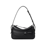 Amazing Song black leather shoulder bag with front zipper and white stitching on white background