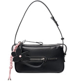 Amazing Song black shoulder bag with flower charm, front zipper, and pink braid detail