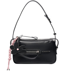 Amazing Song black shoulder bag with flower charm, front zipper, and pink braid detail