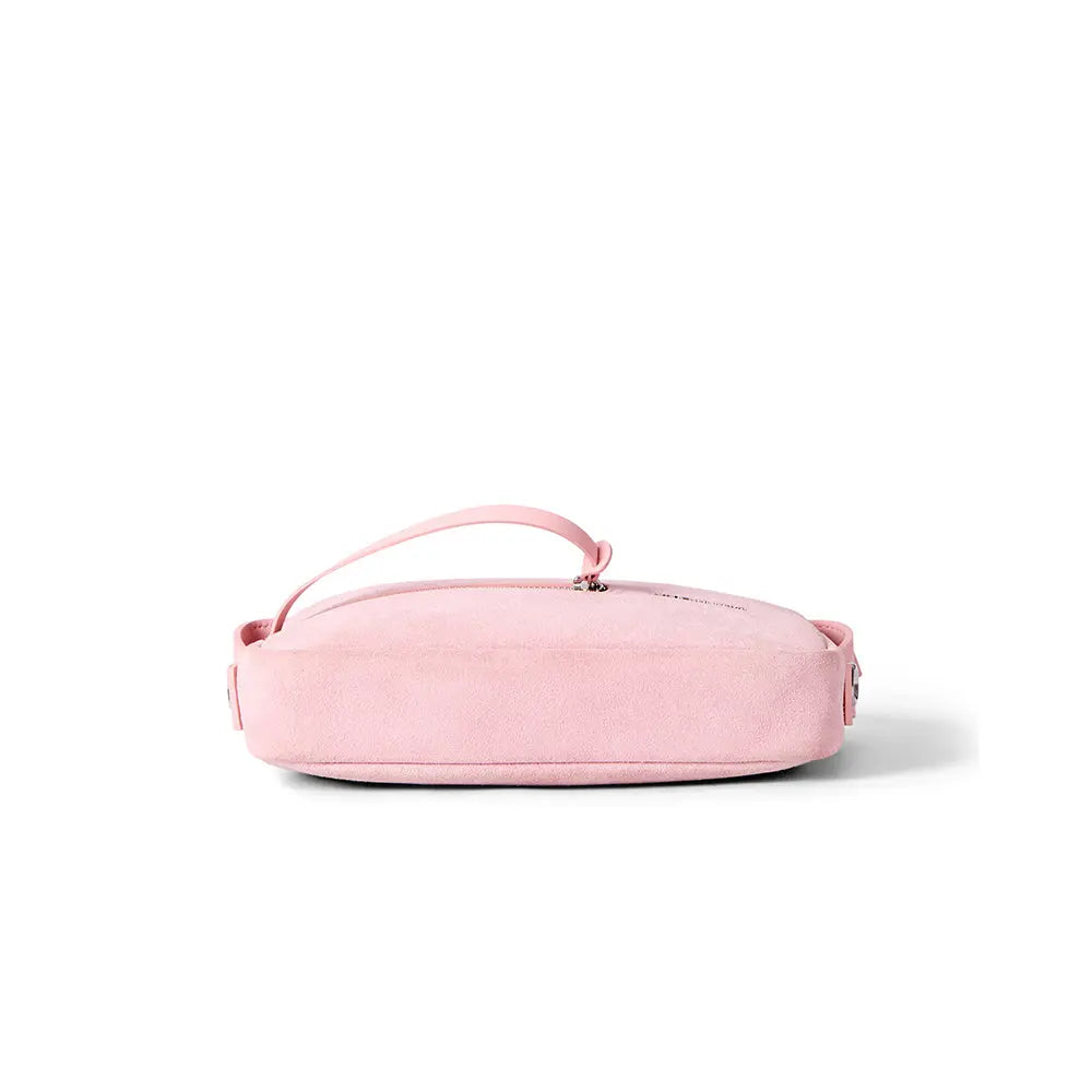 Soft pink suede crossbody bag with slim strap on white background, Amazing Song style