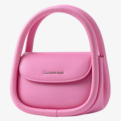 Amazing Song pink handbag with unique double handle design on white background
